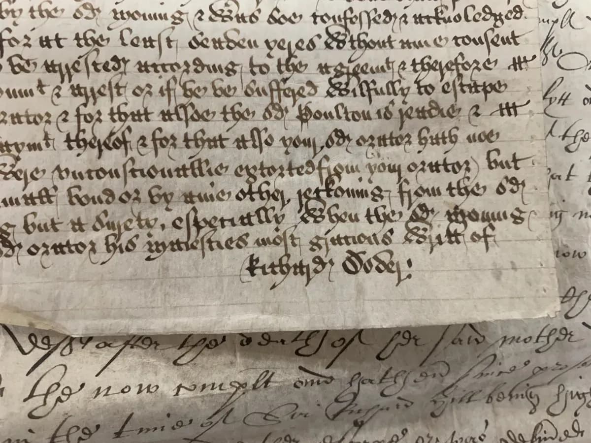 Close view of handwritten text on a medieval manuscript